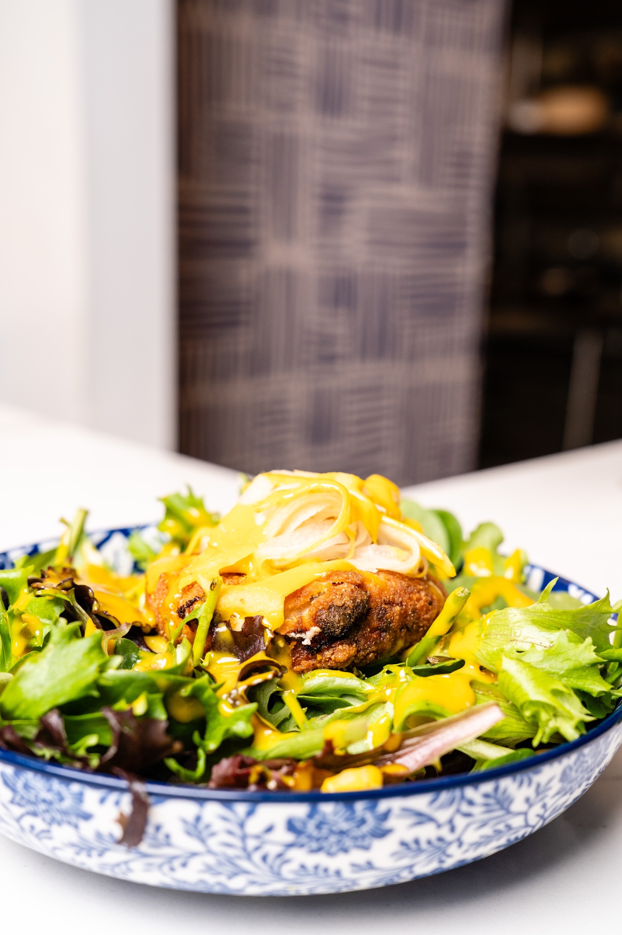 Crispy chicken salad with mango dressing
